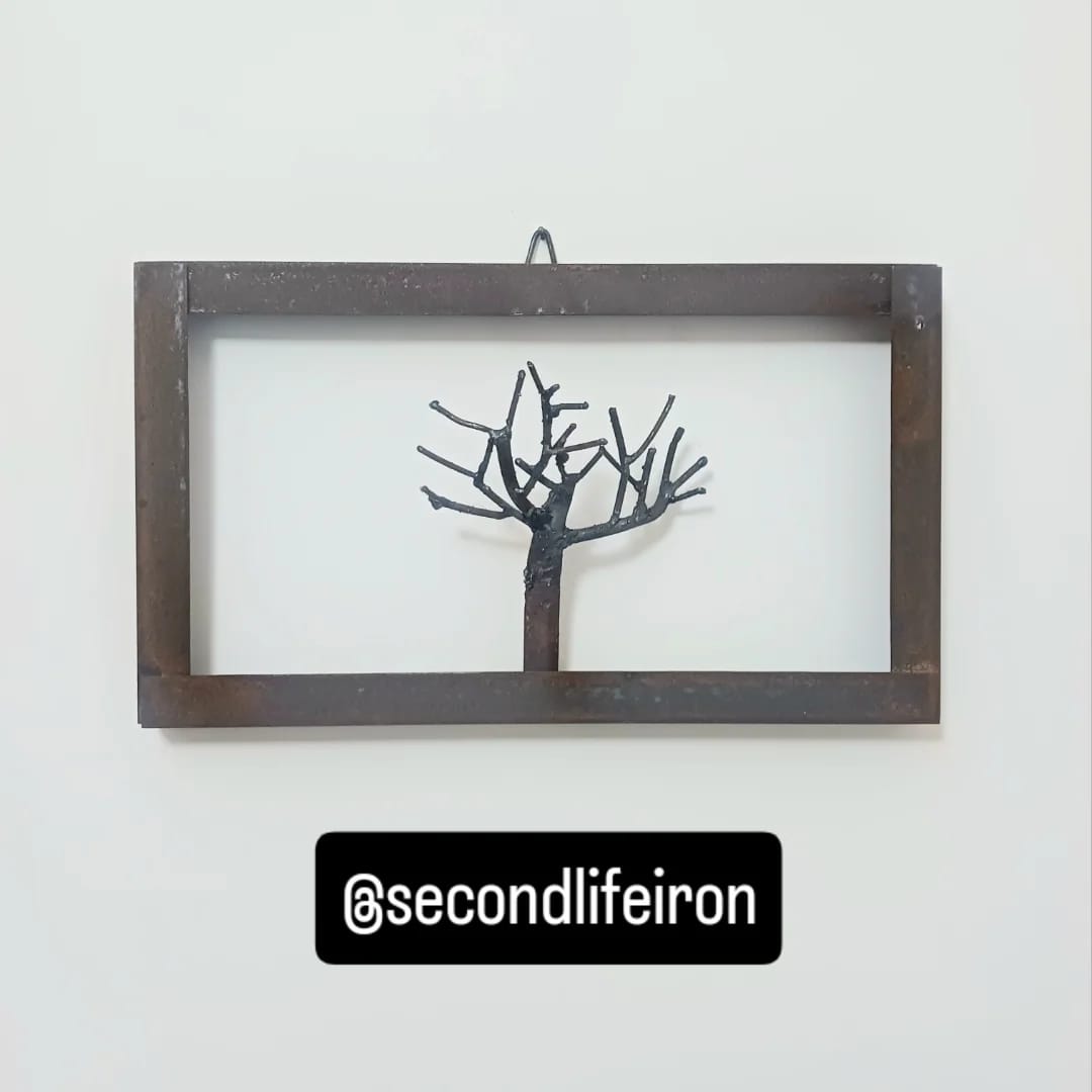 albero in ferro incorniciato "fiorirà"