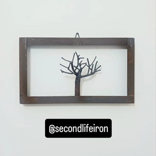 albero in ferro incorniciato "fiorirà"
